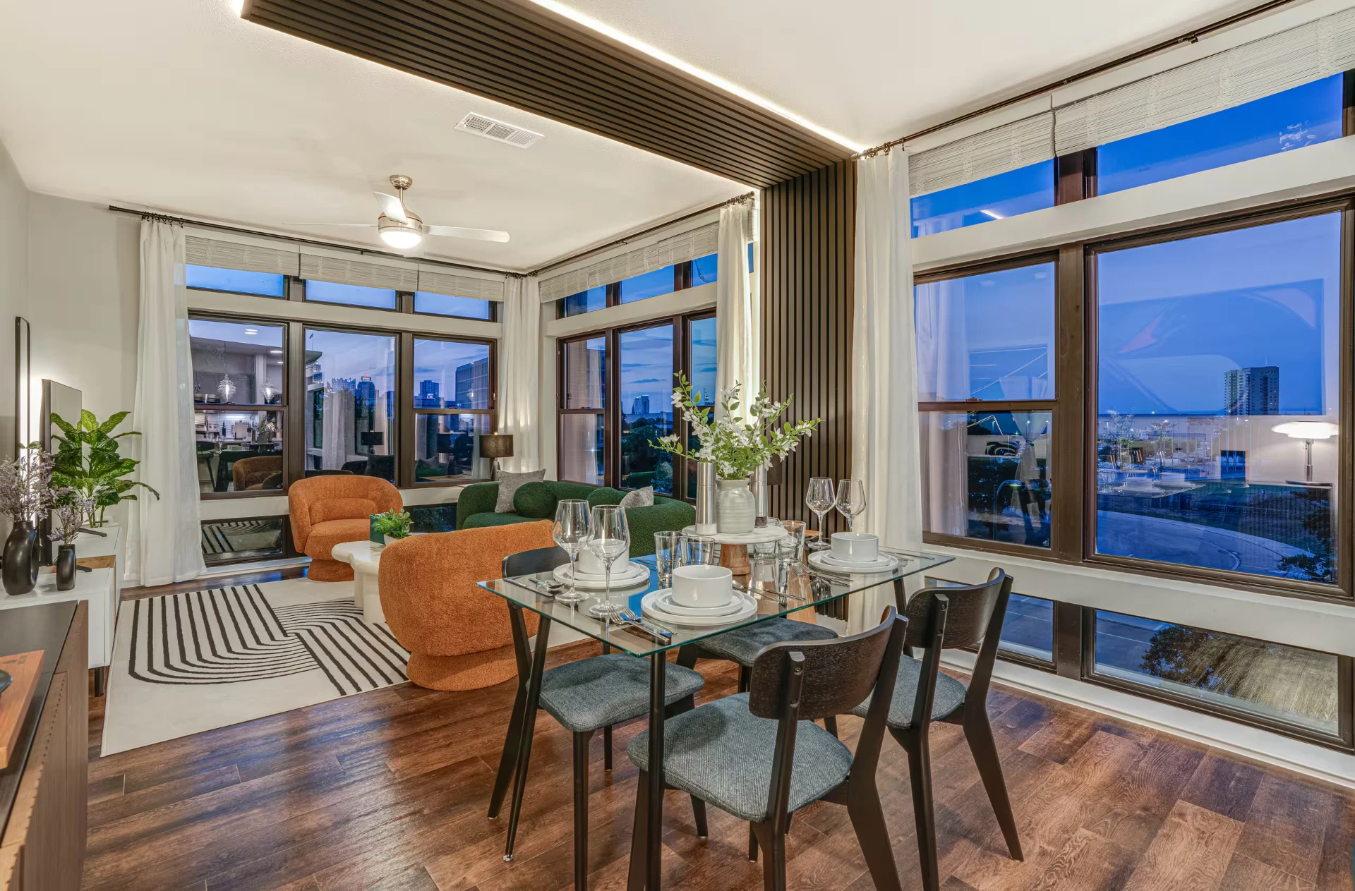Downtown San Antonio apartment with floor-to-ceiling windows and skyline views.