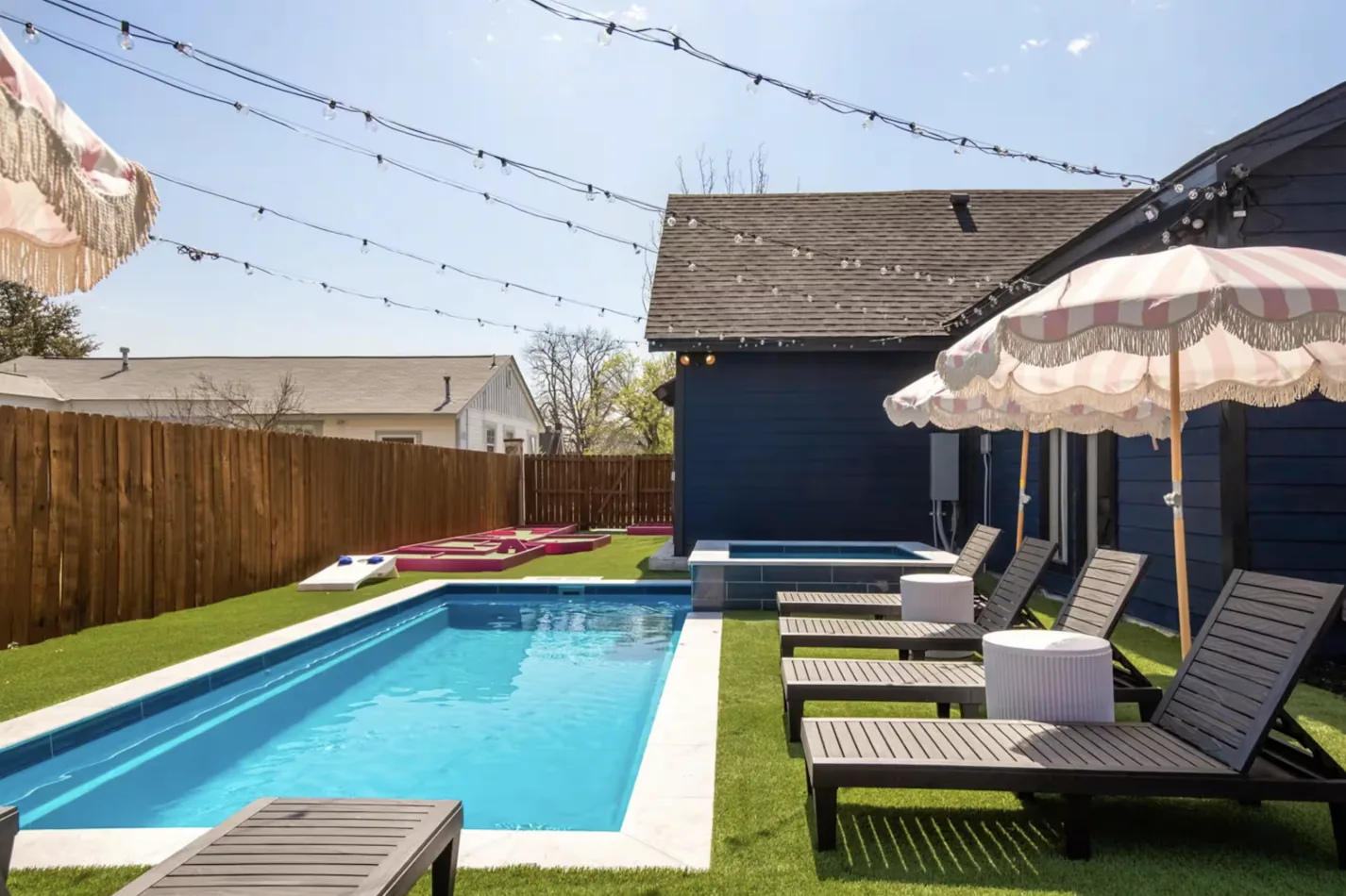 Renovated 1930s historic home in San Antonio’s Monticello Park with a pool and backyard putt-putt course.